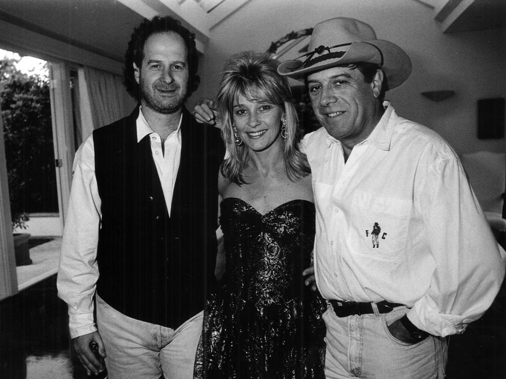 Gudinski, left, with his wife Sue and another Aussie music legend, Molly Meldrum. Picture: Bruce Magilton