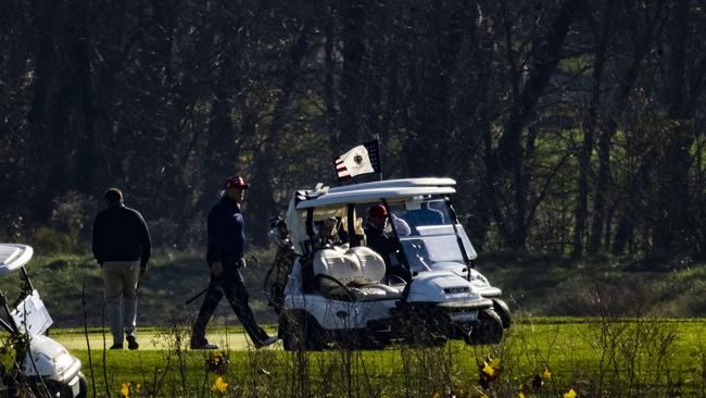 President Donald Trump plays golf at his club, Trump National Golf Club, on November 14, in Sterling Virginia. Picture: AFP