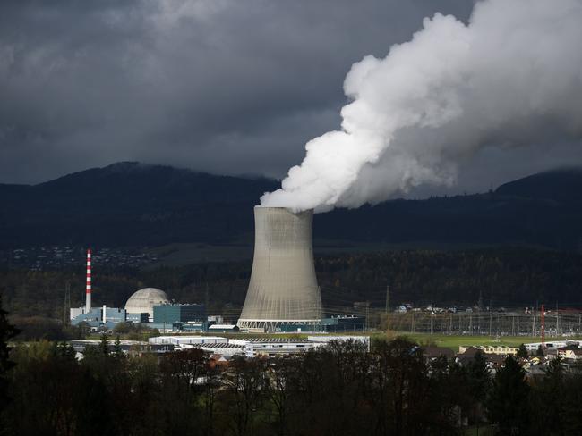 (FILES) This file photo taken on November 11, 2016 shows The Goesgen Nuclear Power Plant near Daeniken, Northern Switzerland.  ?Switzerland on May 21, 2017, votes on whether to overhaul its national energy policy, with proposals on phasing out nuclear energy and boosting reliance on renewables, in the latest referendum in the country's direct democracy system. / AFP PHOTO / FABRICE COFFRINI