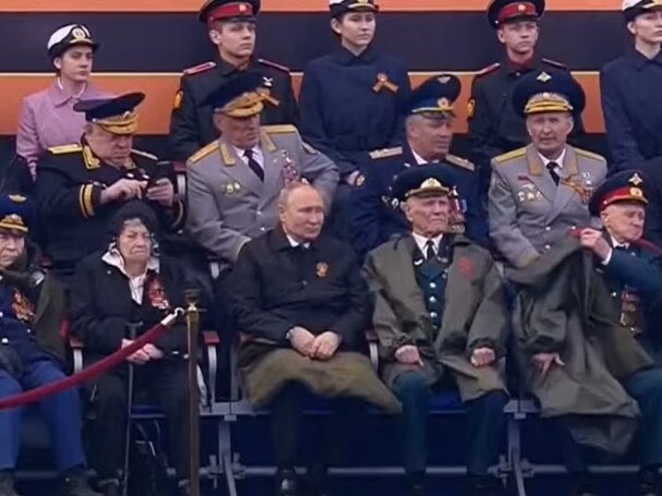 Vladimir Putin seen huddling under a thick blanket during the Victory Day parade in Moscow. Picture: Supplied.