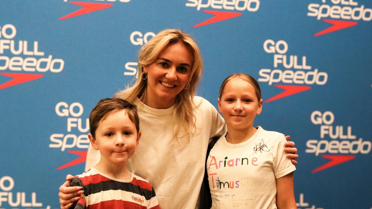 Tassie golden girl Ariarne Titmus makes a splash in Launceston meeting fans Louis Bennett (6) and Charlotte Bennett (10) from Westbury. Picture: Stephanie Dalton