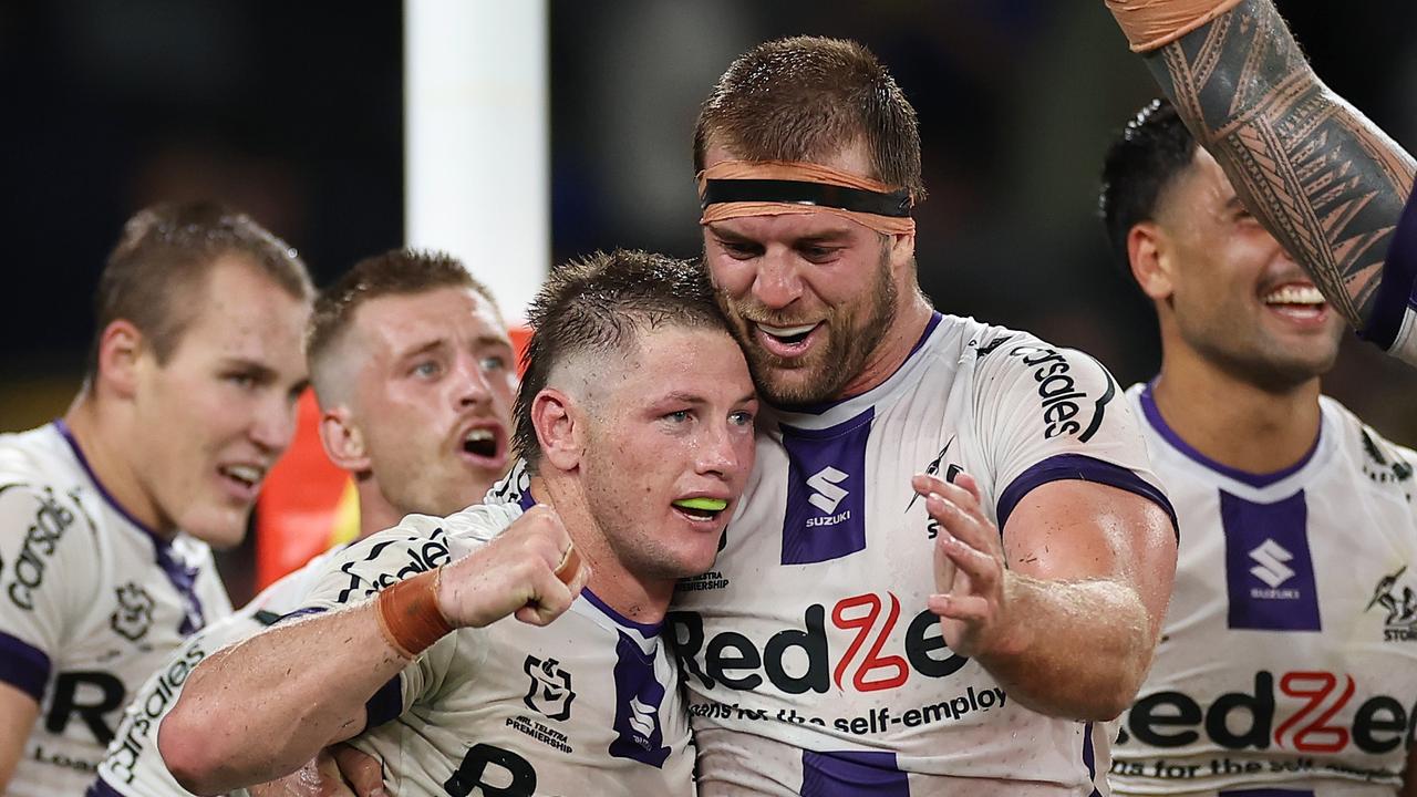 The Storm celebrated the huge golden point win. Photo by Cameron Spencer/Getty Images