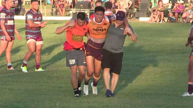 Andre Savelio leaves the field with a leg injury early in Brisbane’s 16-6 win over the CQ Capras on Saturday night.
