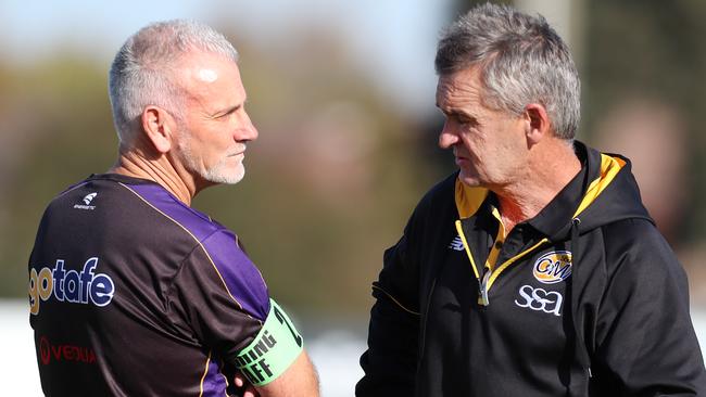 GV co-coach Mark Lambourne and O&amp;M coach Damien Sexton catch up after the match.