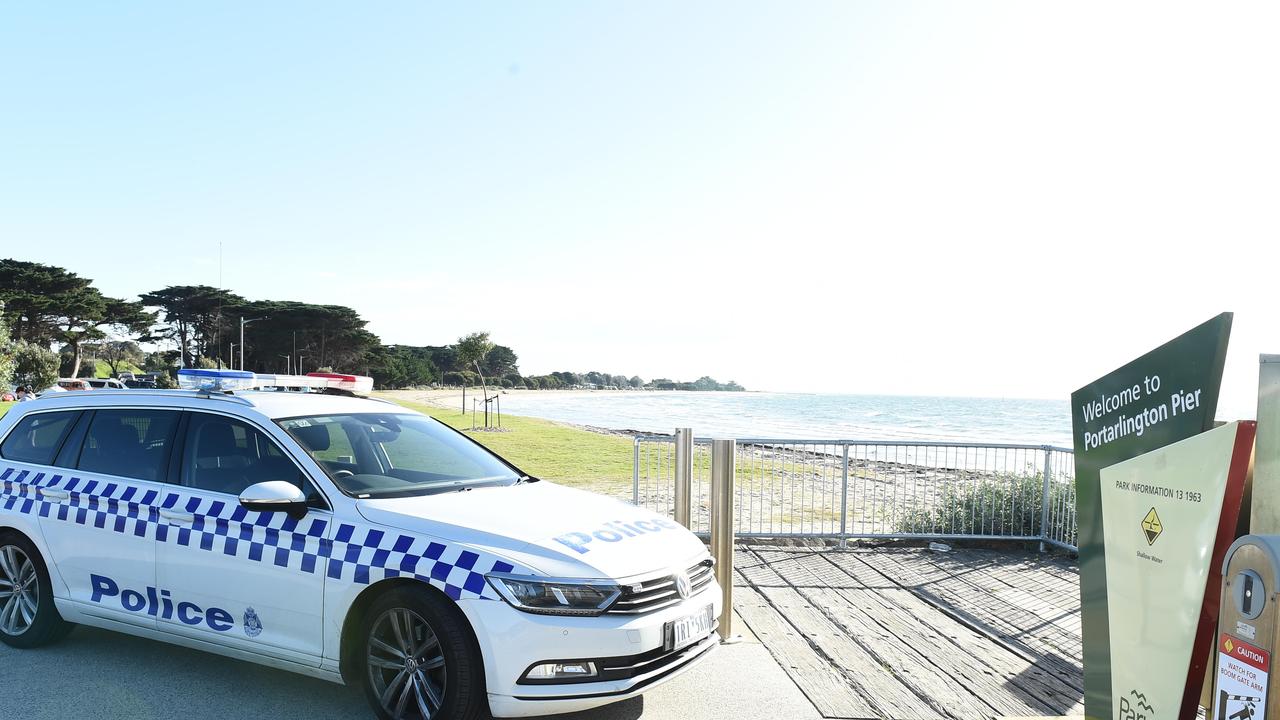 Police on scene at the Portarlington Pier. Picture: David Smith