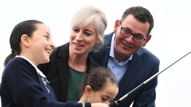 Catherine Andrews (2nd left), and Victorian Premier Daniel Andrews (2nd right) are seen at the Mordialloc Pier, Melbourne, Wednesday, October 31, 2018. The Premier announced that a re-elected Andrews Government will improve boating and fishing regulations and licensing across Victoria. (AAP Image/James Ross) NO ARCHIVING