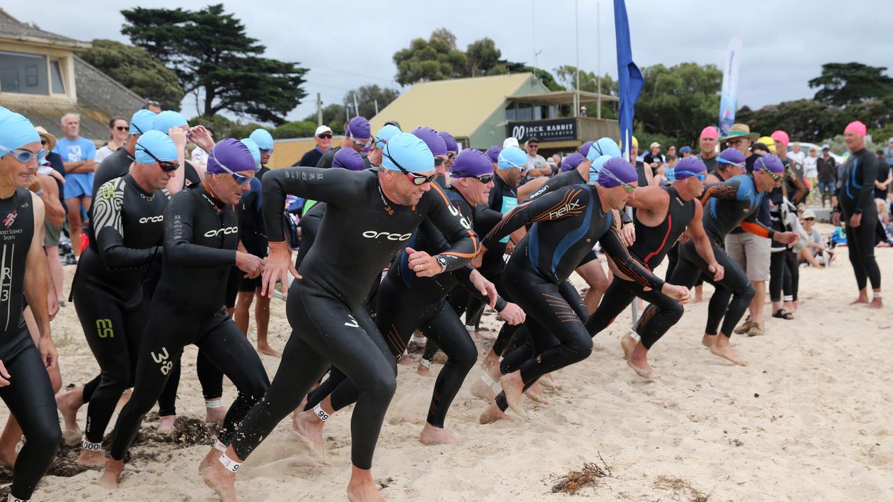 Wreck2Reef swims at Indented Head beach. 40-49 and 50-59 year old male race gets under way. Picture: Mike Dugdale