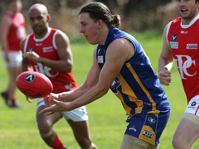 Steven Twomey of Mt Lilydale handpasses during VAFA Reserves: Mt Lilydale OC v Parkside on Saturday, August 18, 2018, in Lilydale, Victoria, Australia. Picture: Hamish Blair