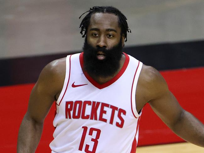 HOUSTON, TEXAS - DECEMBER 17: James Harden #13 of the Houston Rockets controls the ball during the first half of a game against the San Antonio Spurs at the Toyota Center on December 17, 2020 in Houston, Texas. NOTE TO USER: User expressly acknowledges and agrees that, by downloading and or using this photograph, User is consenting to the terms and conditions of the Getty Images License Agreement.   Carmen Mandato/Getty Images/AFP == FOR NEWSPAPERS, INTERNET, TELCOS & TELEVISION USE ONLY ==