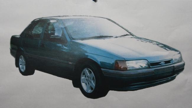 Police are looking for information about a sedan that was seen leaving the reserve where Mr Russouw was murdered.