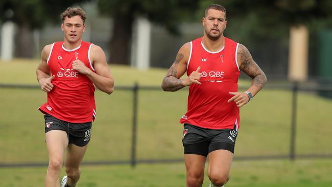 Lance Franklin runs laps with Will Hayward. Picture: Getty