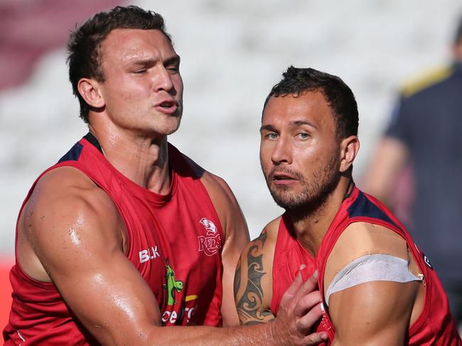 Jake Schatz and Quade Cooper at QLD Reds training, Ballymore. Pic Jono Searle.