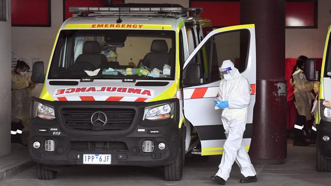 An ambulance is cleaned at the Royal Melbourne Hospital. Picture: William West