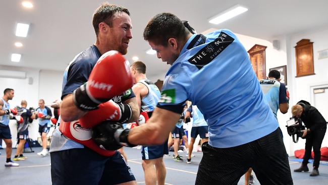 Bill Akkaway gives James Maloney a proper workout. (Grant Touville)