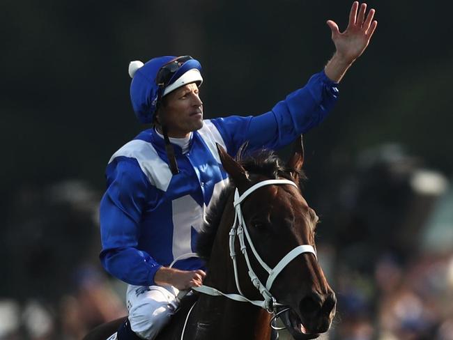 SYDNEY, AUSTRALIA - APRIL 13: Hugh Bowman riding Winx celebrates as he returns to scale after winning race 7 the Longines Queen Elizabeth Stakes during The Championships Day 2 at Royal Randwick Racecourse on April 13, 2019 in Sydney, Australia. (Photo by Mark Metcalfe/Getty Images)