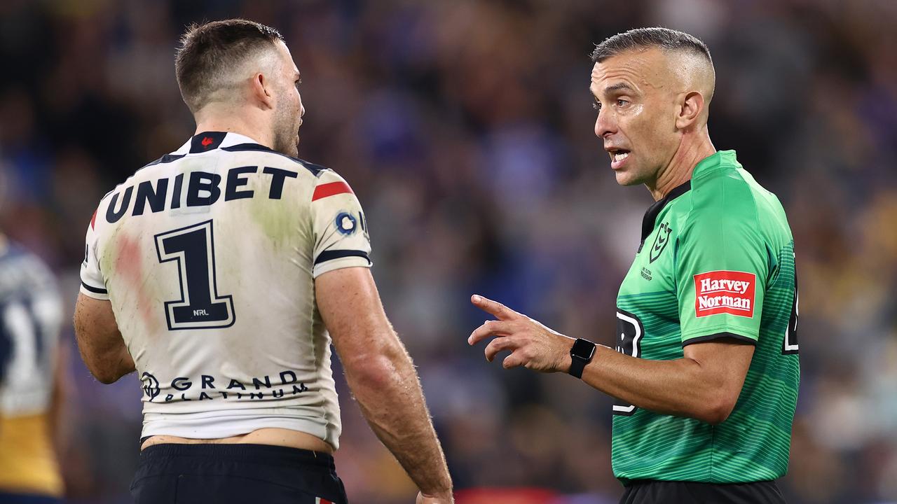 Referee Matt Cecchin talks to James Tedesco. Picture: Cameron Spencer/Getty Images