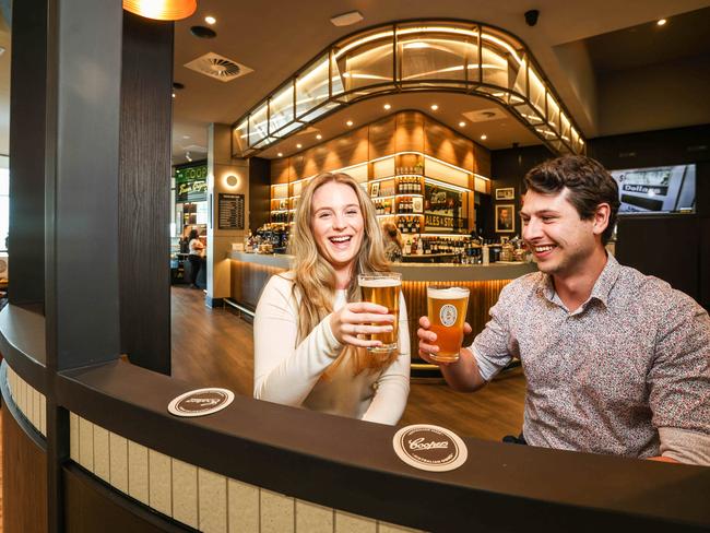 News Adv Jodie Knighton & Nick Adeney having a beer at the new-look Coopers Alehouse opening on Thursday, as part of the Adelaide Airport's $165m terminal expansion. Pictures/Russell Millard