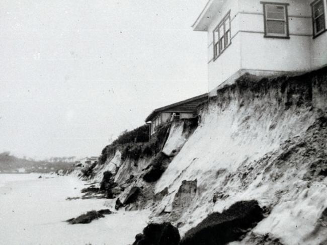 Coastal damage during the 1954 cyclone. This is erosion at the Palm Beach surf lifesaving club on the Gold Coast.