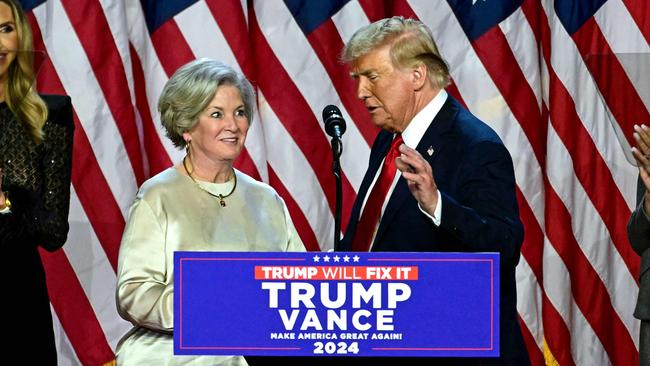 Donald Trump greets his campaign manager Susie Wiles at his Palm Beach election event. Picture: AFP.