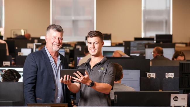 MyVenue chief executive officer Tim Stollznow with developer Angus Juers. Picture: Russell Millard