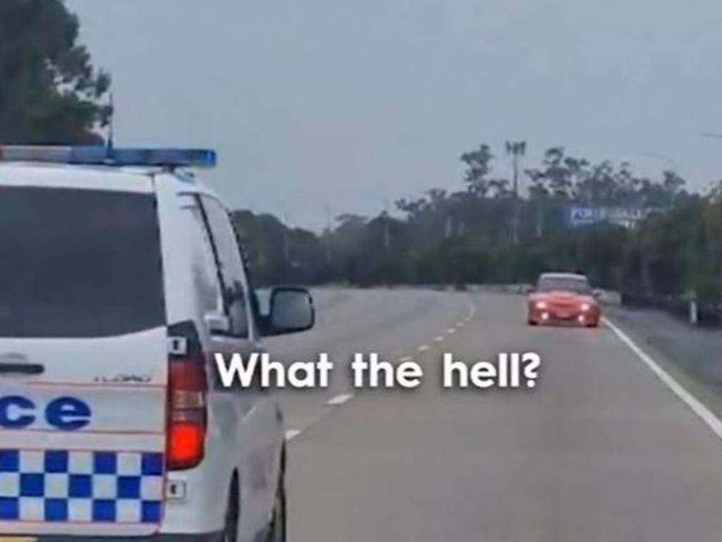 Police stationed themselves in front of the car to stop it from speeding away. Picture: 9News