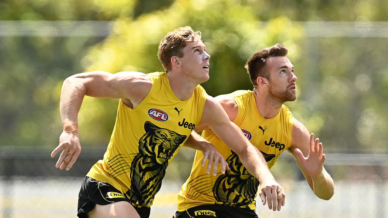 GOLD COAST, AUSTRALIA - OCTOBER 14: Tom J. Lynch and Noah Balta of the Tigers compete for the ball during a Richmond Tigers AFL training session at Metricon Stadium on October 14, 2020 in Gold Coast, Australia. (Photo by Quinn Rooney/Getty Images)