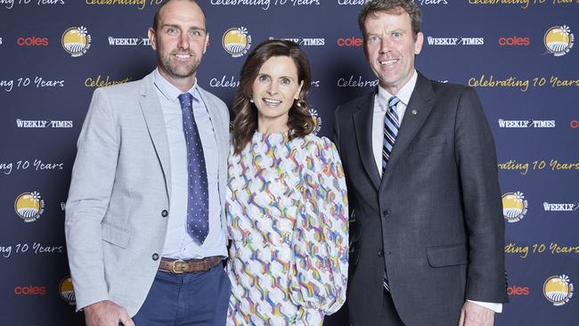 The Weekly Times Coles Farmer of the Year 10-year anniversary at the National Portrait Gallery in Canberra. (From left) 2015 Farmers of the Year Brad and Becc Couch from Timboon VIC with their local member, MP for Wannon Dan Tehan.