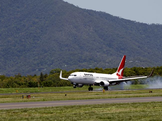 Qantas flight diverted after drunk passenger tries to steal whisky ...