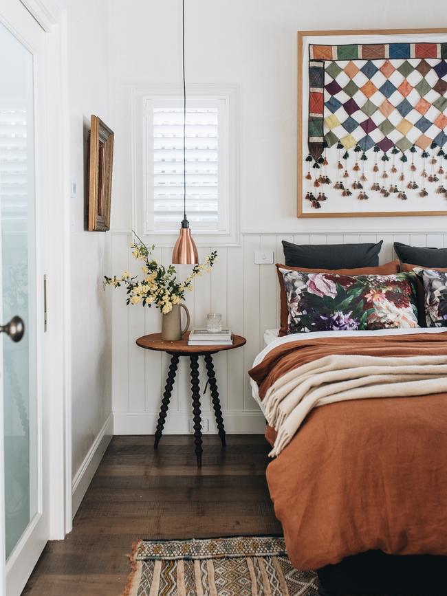 Charleston Cottage’s Duncan suite bedroom features a sumptuous king-sized bed, soft organic linens, comfy throws and original artworks. Picture: Abbie Melle