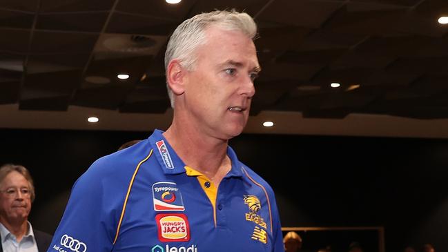 PERTH, AUSTRALIA - JULY 09: Adam Simpson walks in a press conference with Don Pyke (WCE CEO) and Paul Fitzpatrick (WCE Chair) after the West Coast Eagles and senior coach Adam Simpson mutually agreed that his 11-year tenure at the club will come to an end during a West Coast Eagles AFL press conference at Mineral Resources Park on July 09, 2024 in Perth, Australia. (Photo by Paul Kane/Getty Images)