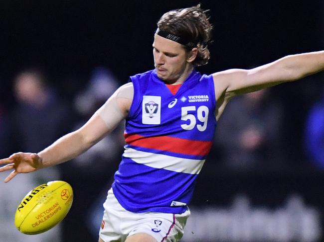 MELBOURNE, AUSTRALIA - MAY 21: Jordan Boyd of the Bulldogs kicks the ball during the round six VFL match between Frankston and Footscray at Skybus Stadium on May 21, 2021 in Melbourne, Australia. (Photo by Morgan Hancock/AFL Photos/via Getty Images)