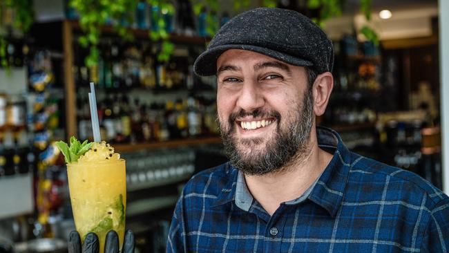 George Lagos from the Palais Hotel with a cocktail. Picture: AAP/Roy VanDerVegt