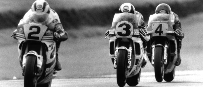 Wayne Gardner (2) leads Wayne Rainey (3) and Christian Sarron (4) down the home straight at Phillip Island.