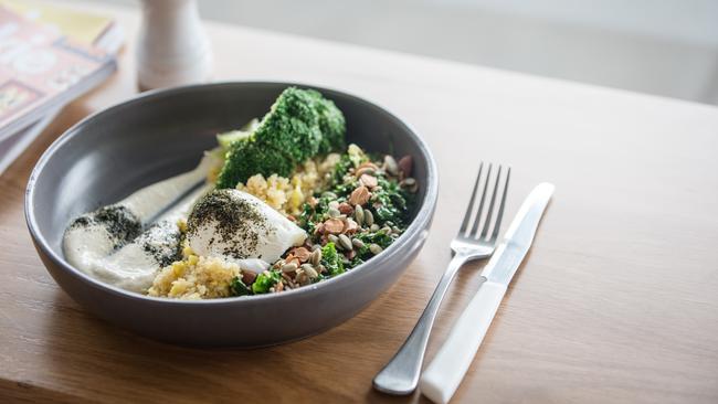 Lorna’s health bowl with coconut kale quinoa and a poached egg. Picture: Eugene Hyland