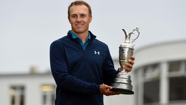 US golfer Jordan Spieth poses for pictures with the Claret Jug.