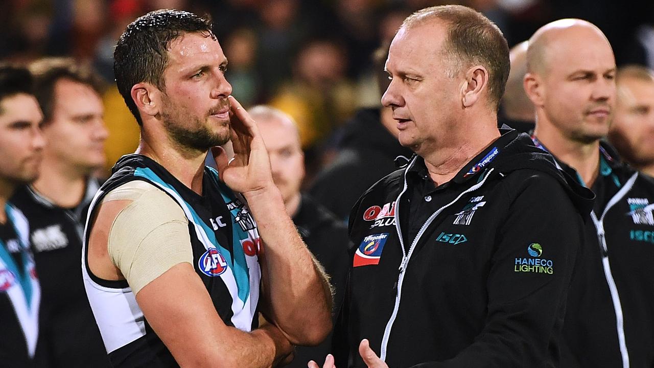 ADELAIDE, AUSTRALIA - AUGUST 04: Travis Boak captain of Port Adelaide chats to Ken Hinkley Port Adelaide coach after the round 20 AFL match between the Adelaide Crows and the Port Adelaide Power at Adelaide Oval on August 4, 2018 in Adelaide, Australia. (Photo by Mark Brake/Getty Images)