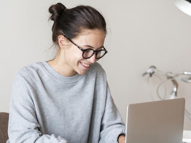 Woman using computer laptopat home