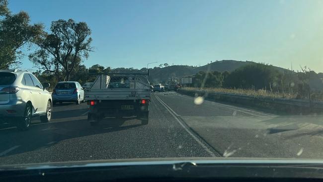 William Hovel Dr was closed for several hours after the fatal crash in Belconnen on January 10, 2023. Picture: Kheng Canberran