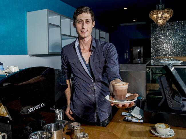 The Long Leaf Cafe at Hope Island has been handing out free coffees ahead of its official launch in the next few weeks. Barista James Babington. Picture: Jerad Williams