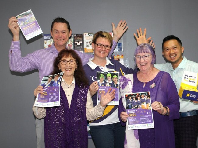 GET PURPLE: From left: John Dawson, Janelle Saffin MP, Leanne Thompson, Carmel Cook and Ronny Susanto. Photo: Marie Cook