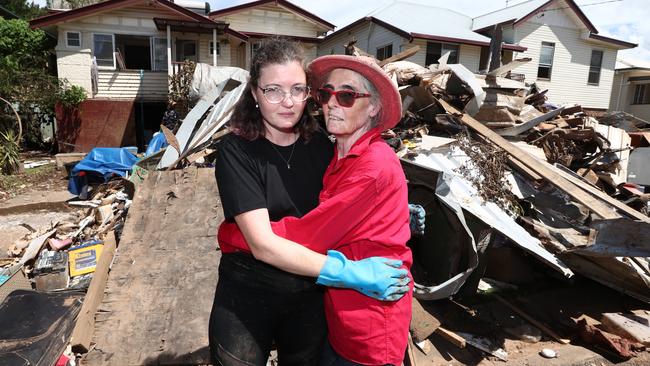 Marie Hainaut and daughter Helene at their Phyllis St home in South Lismore in the aftermath of the devastating floods. Picture: Jason O'Brien