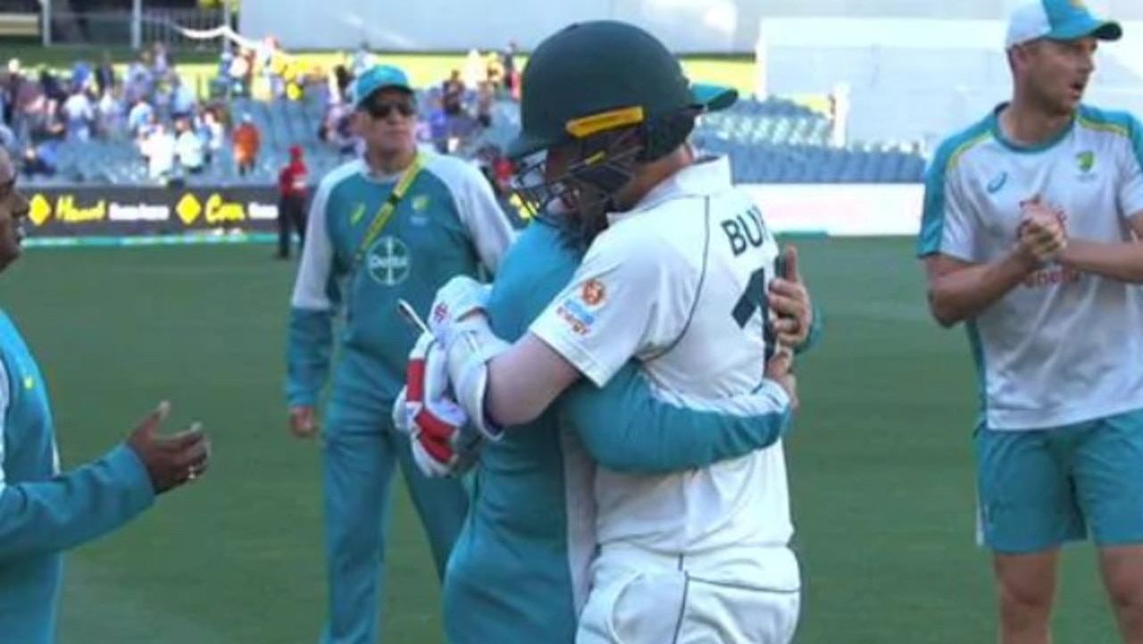 Justin Langer embraces Joe Burns after he hit the winning runs.