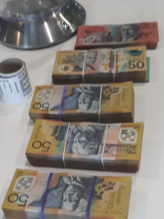 Cash allegedly seized during investigations into a northwest Sydney 'dial-a-dealer' drug syndicate. Picture: NSW Police