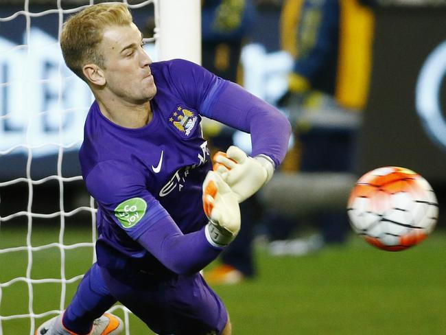 City goalkeeper Joe Hart stops the Seydou Keita penalty kick giving City the win. Pic: Michael Klein