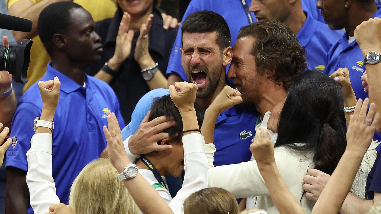 Novak Djokovic celebrates with American actor Matthew McConaughey. Al Bello/Getty Images/AFP