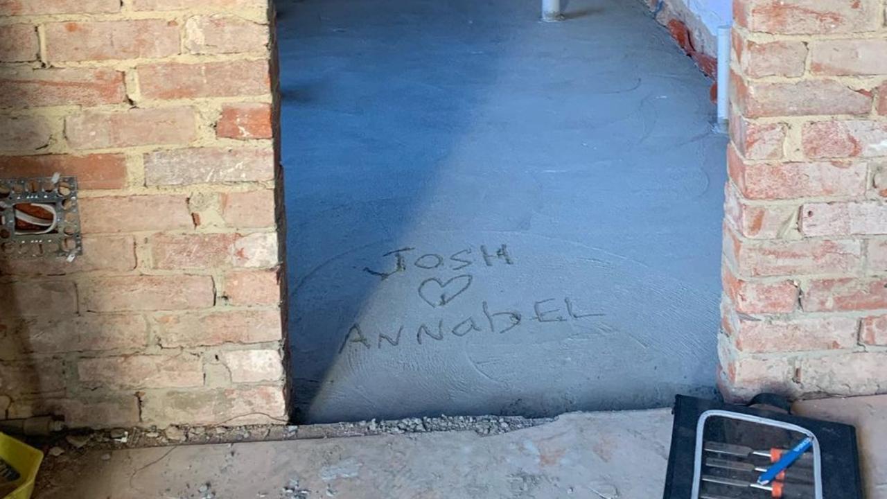 The couple drew their names in the concrete. They plan to live in the home for decades to come. Picture: Supplied