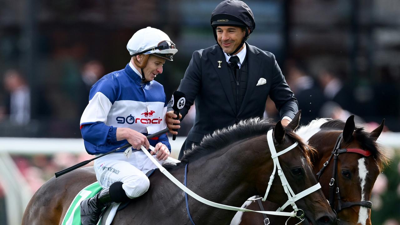 James McDonald riding Atishu is interviewed by Billy Slater after winning the TAB Empire Rose Stakes. (Photo by Quinn Rooney/Getty Images)