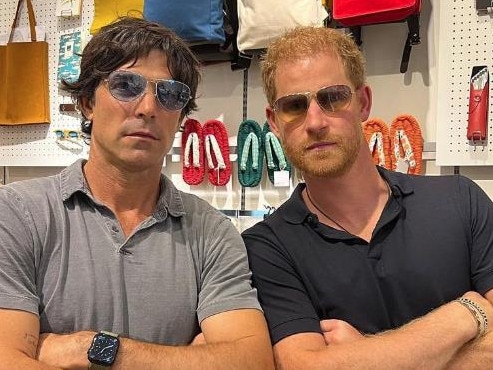 Prince Harry hams it up with good friend Nachos Figueras in Tokyo. Picture: nachfigueros