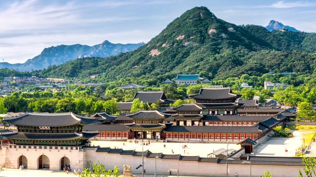 A special counsel is probing the South Korean first lady’s alleged role in moving the presidential compound offices from the traditional Blue House, above at rear behind a royal palace, in Seoul.