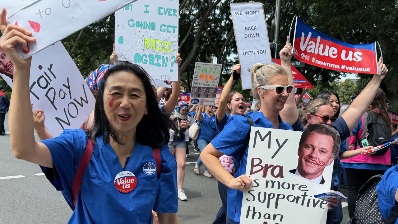 Crowds of nurses and midwives are pictured as they hold a protest march towards New South Wales Parliament House in Sydney. Picture: NewsWire / Gaye Gerard